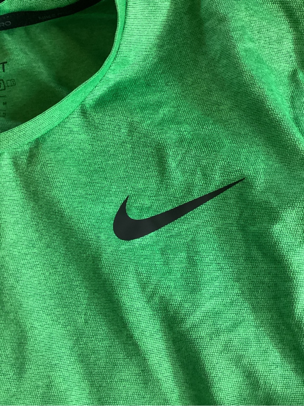 Nike Green Sleeveless Athletic Top with Black Swoosh